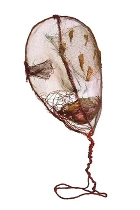 Handmade mask in the shape of a leaf, unique custom design