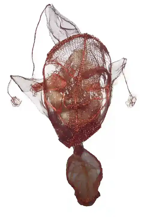Handmade mask in the shape of a leaf, unique custom design