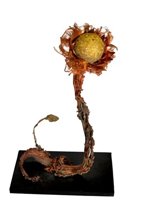Sculpture of a sunflower in the shape of a snake, mixed media, expressionist.