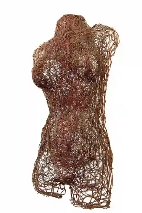 Wall sculpture of a female bust made of copper, natural size.