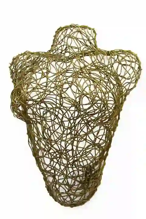 Wall sculpture of a female bust made of brass