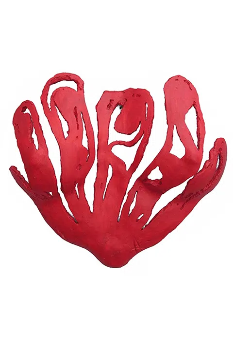 Wall sculpture of a female bust in the shape of a heart, mixed media, modern art.