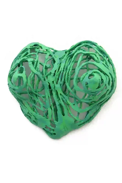 Wall sculpture of a female bust in the shape of a heart, mixed media, modern art.
